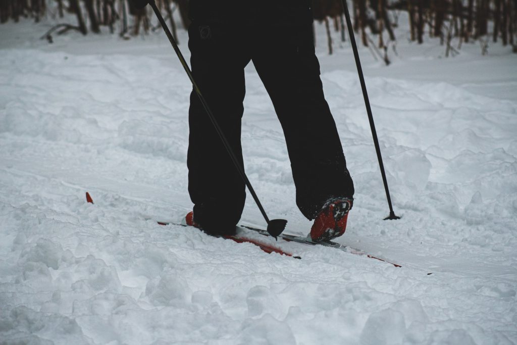 Image of a person waist down cross country skiing in snow in Port Alberni